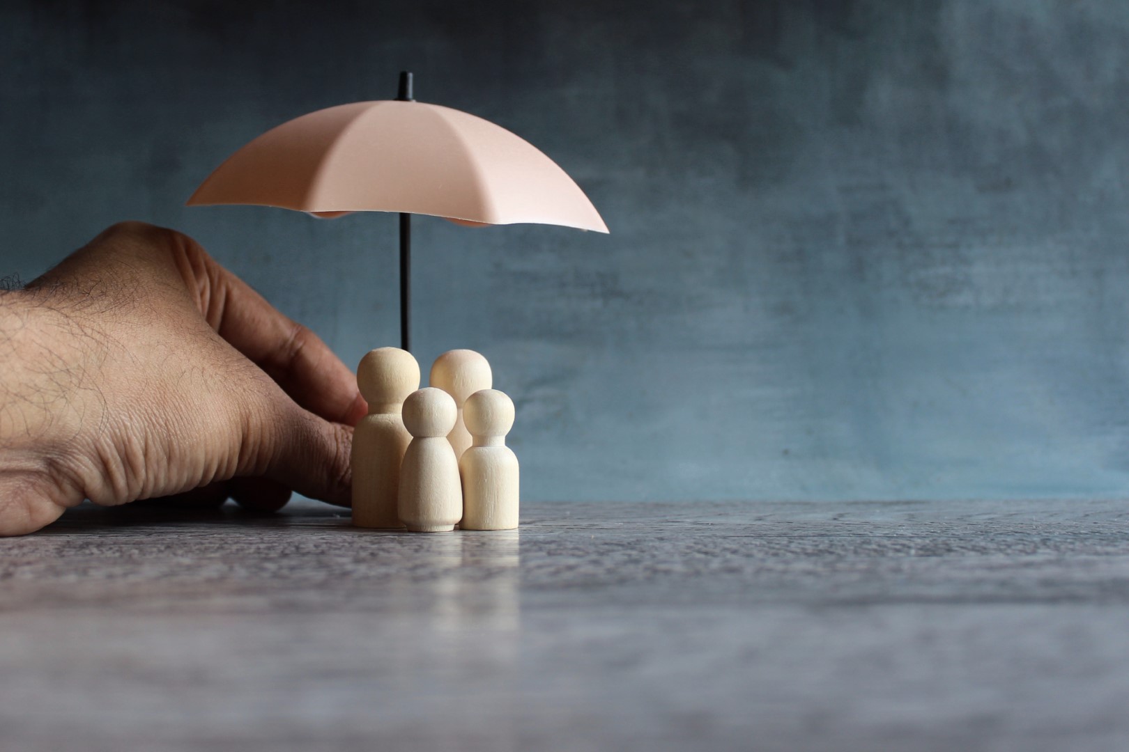 umbrella and wooden dolls