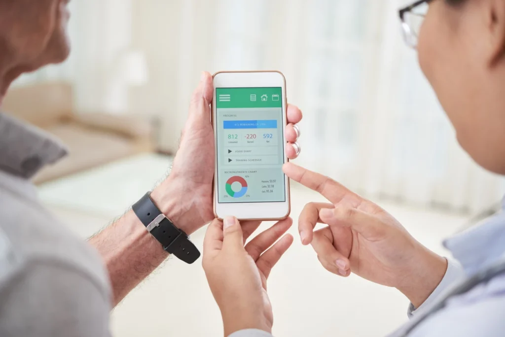 doctor and patient looking application