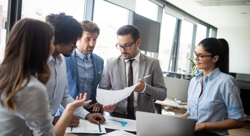 group of business people discussing at work