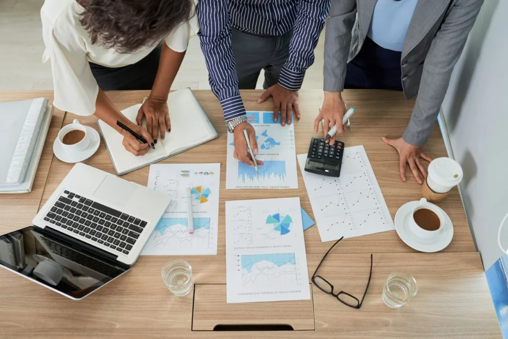 employees analyzing documents