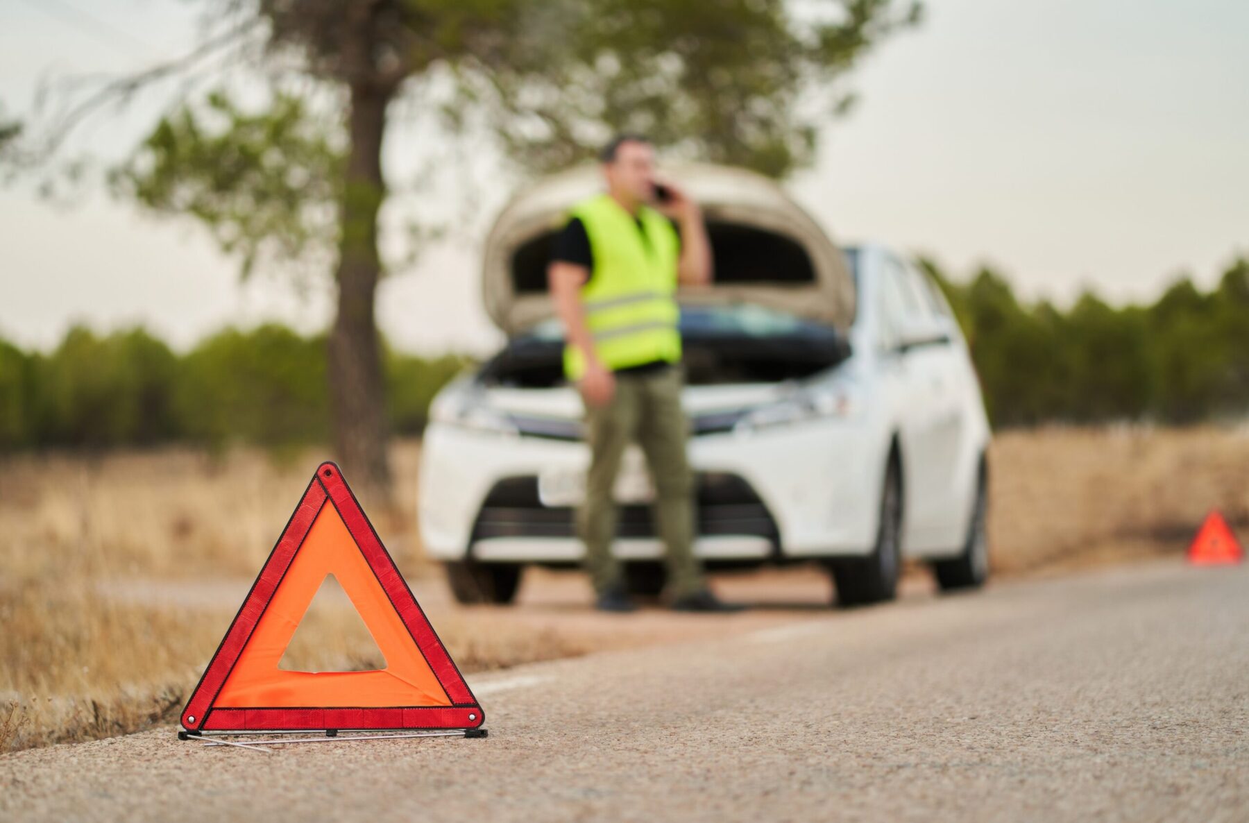 Emergency,Triangles,Signaling,A,Car,Breakdown,And,A,Man,Calling